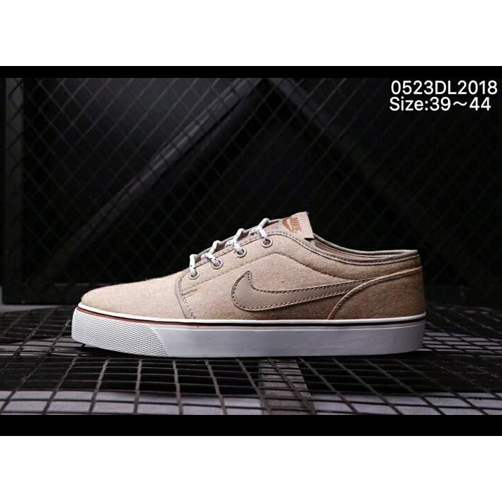 nike toki low txt