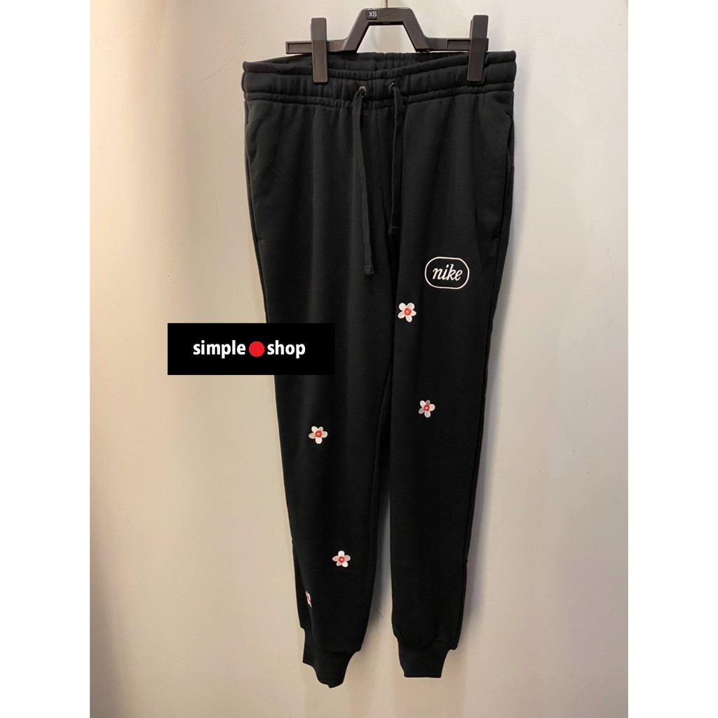 nike embroidered flower sweatpants