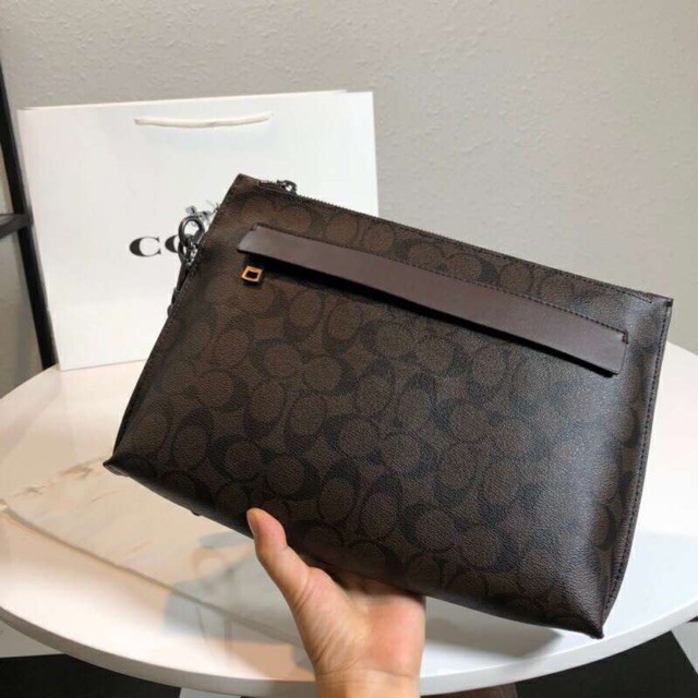 coach men clutch