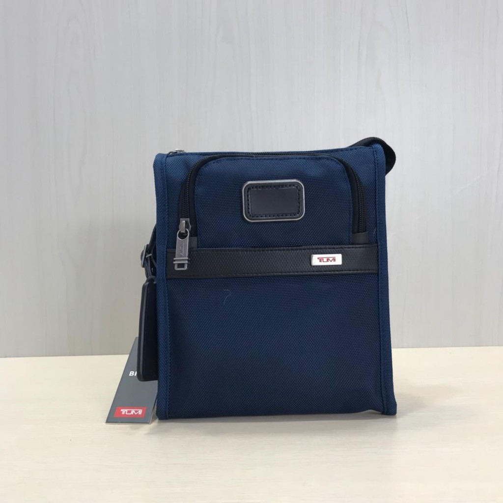 tumi over the shoulder bag