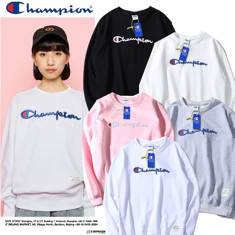 black champion shirt with pink writing