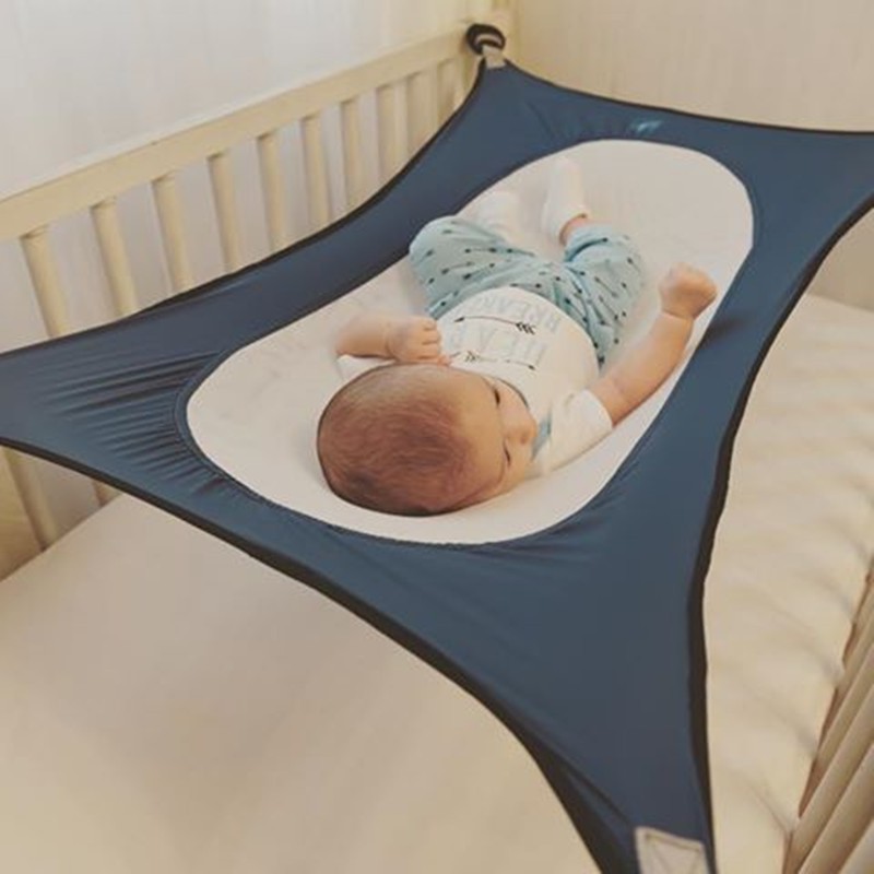 baby cot attached with bed
