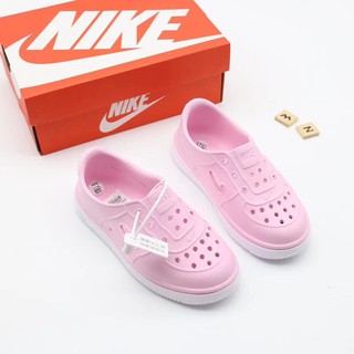 kids pink nike slides