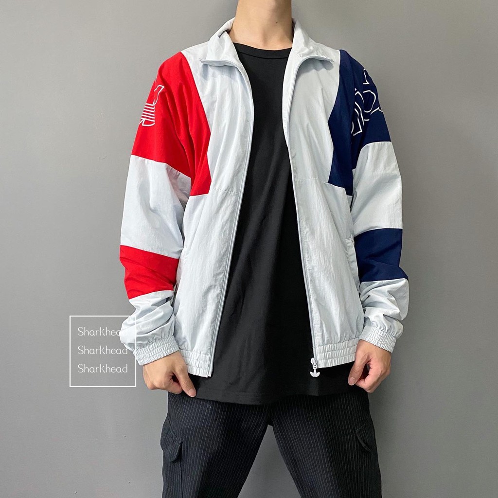 light blue adidas windbreaker