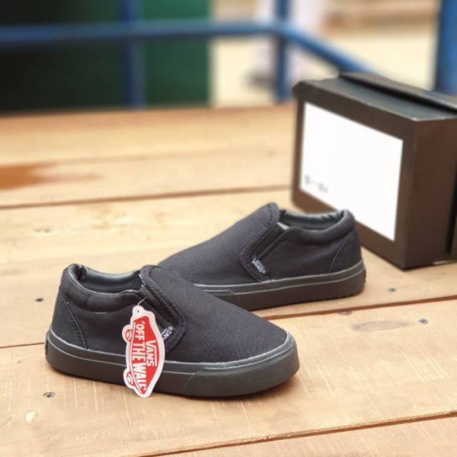 vans slip on full black