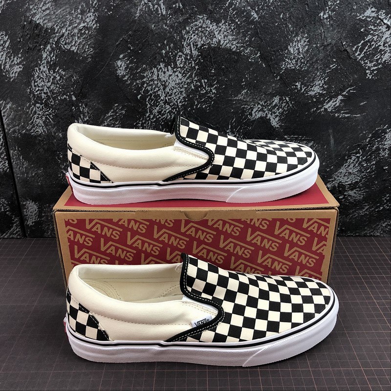 mens checkerboard slip on vans