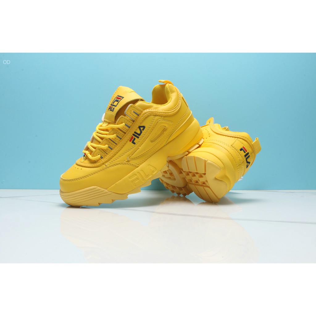 yellow fila shoes