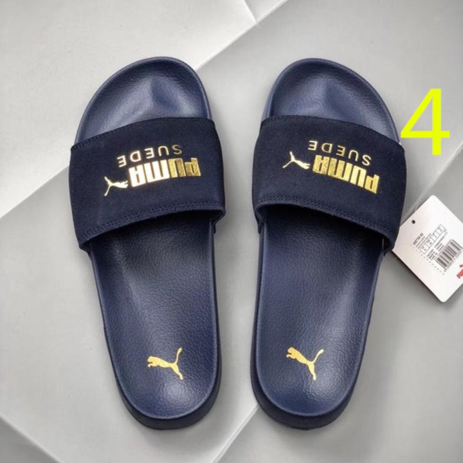 black puma flip flops