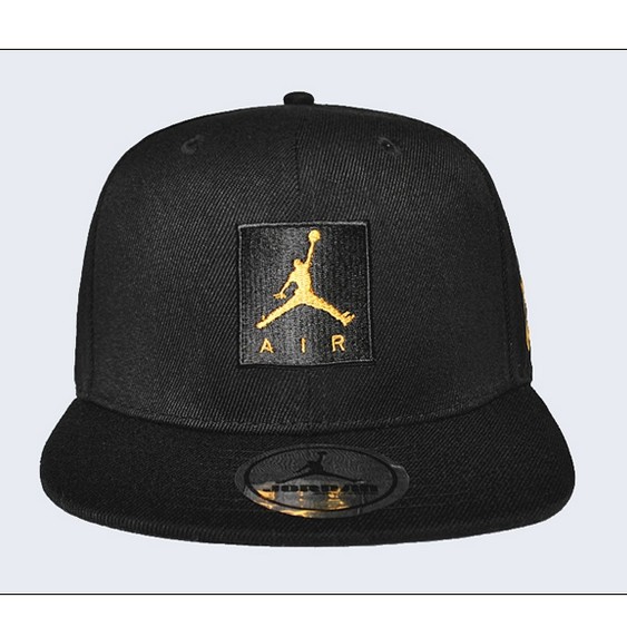 gold and black jordan hat