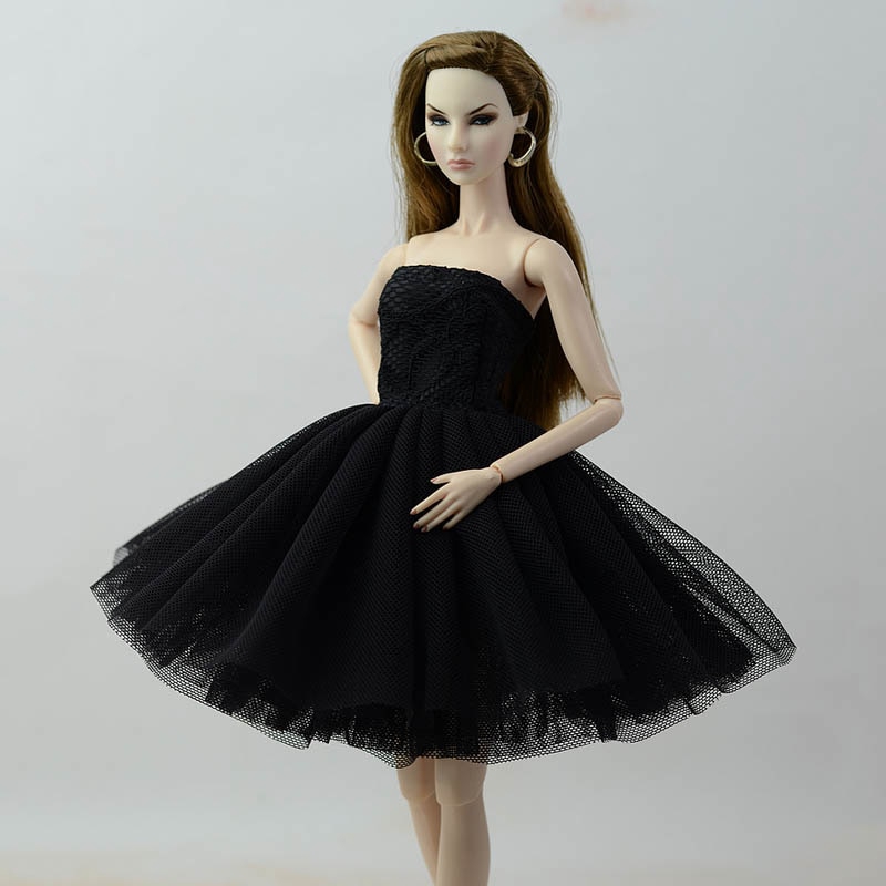 doll in black dress