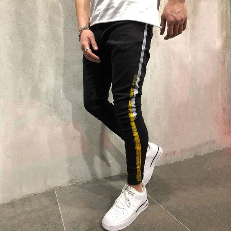 black jeans gold stripe