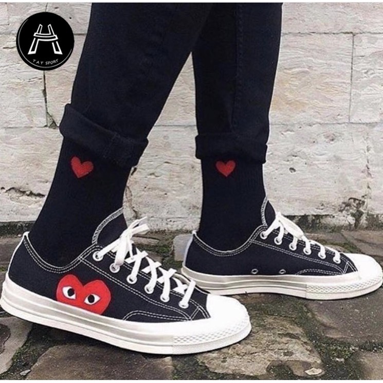 cdg converse low white on feet