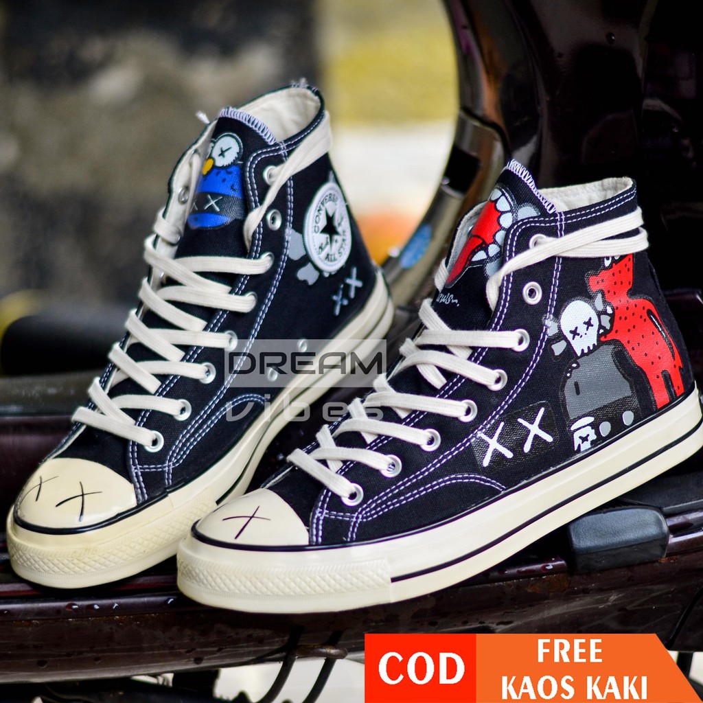 harga converse x kaws