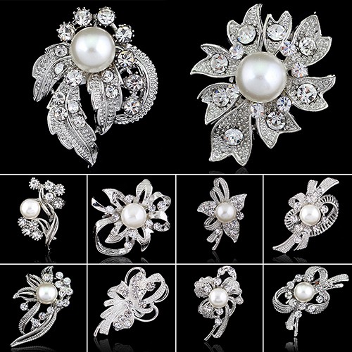 silver brooches and pins