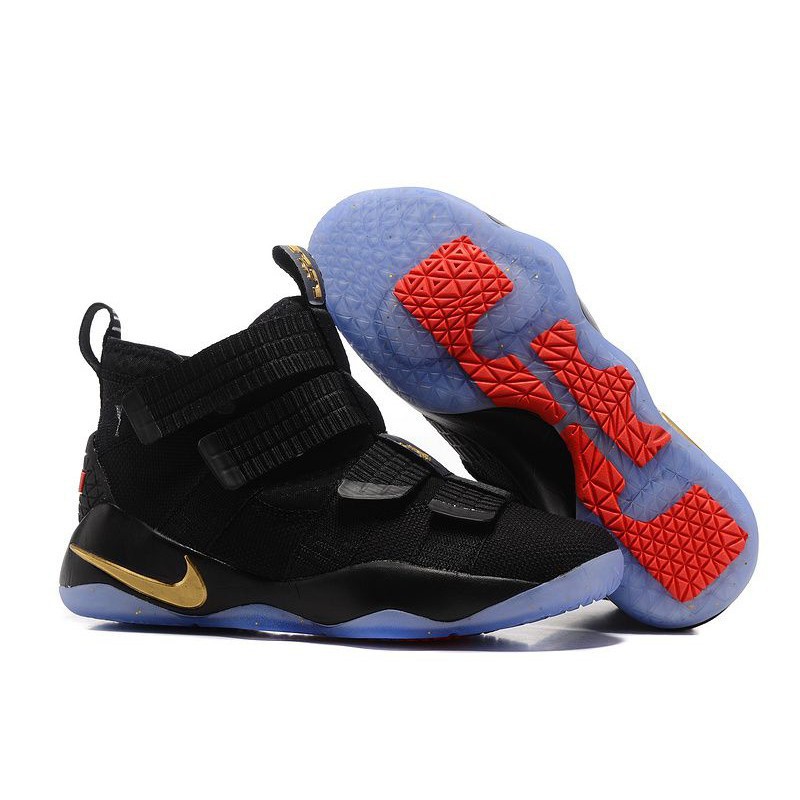 lebron james gold and black shoes