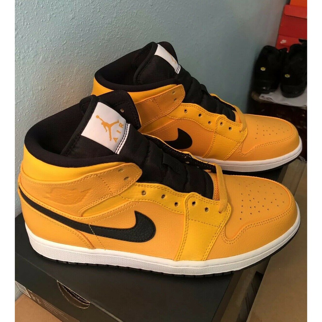 jordan 1 mid black university gold