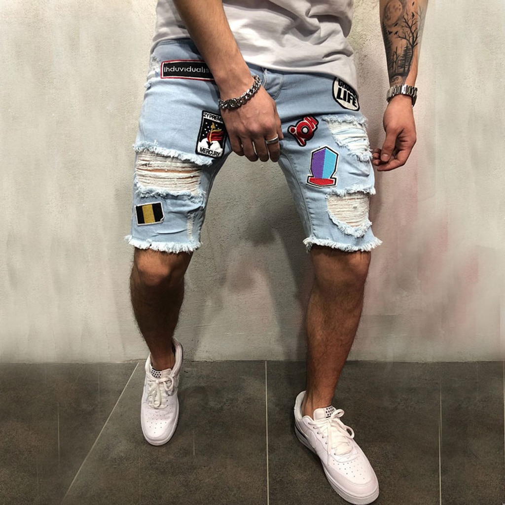 man in short jean shorts