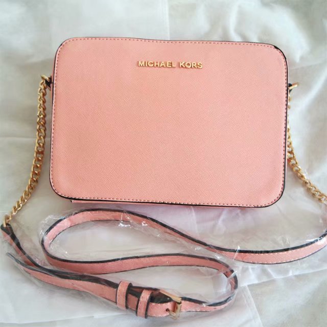 mk pink sling bag