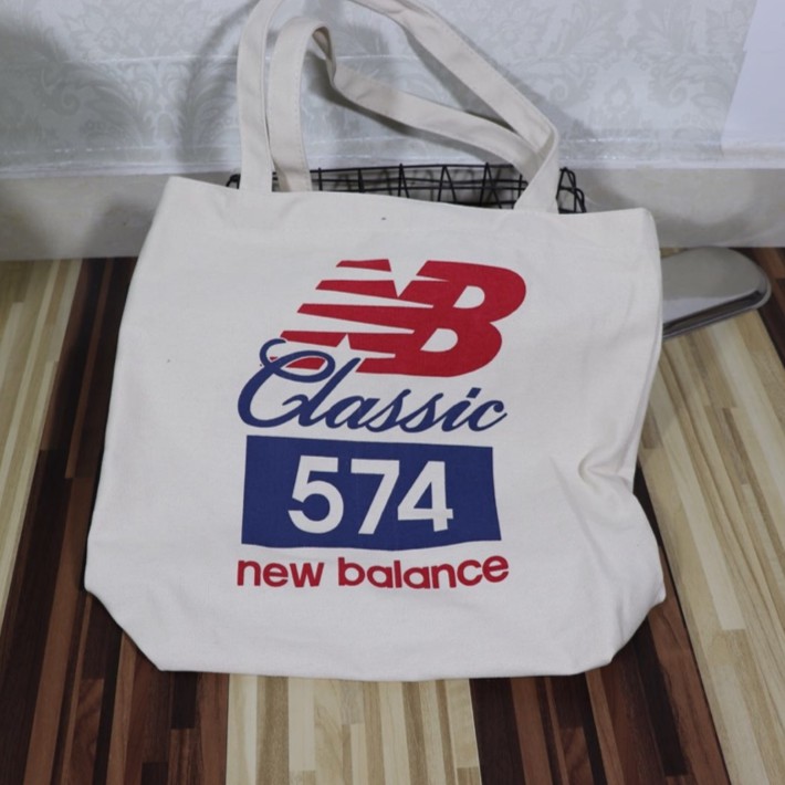 new balance 574 bag