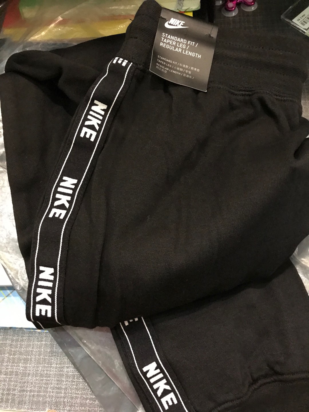 standard fit tapered leg regular length nike