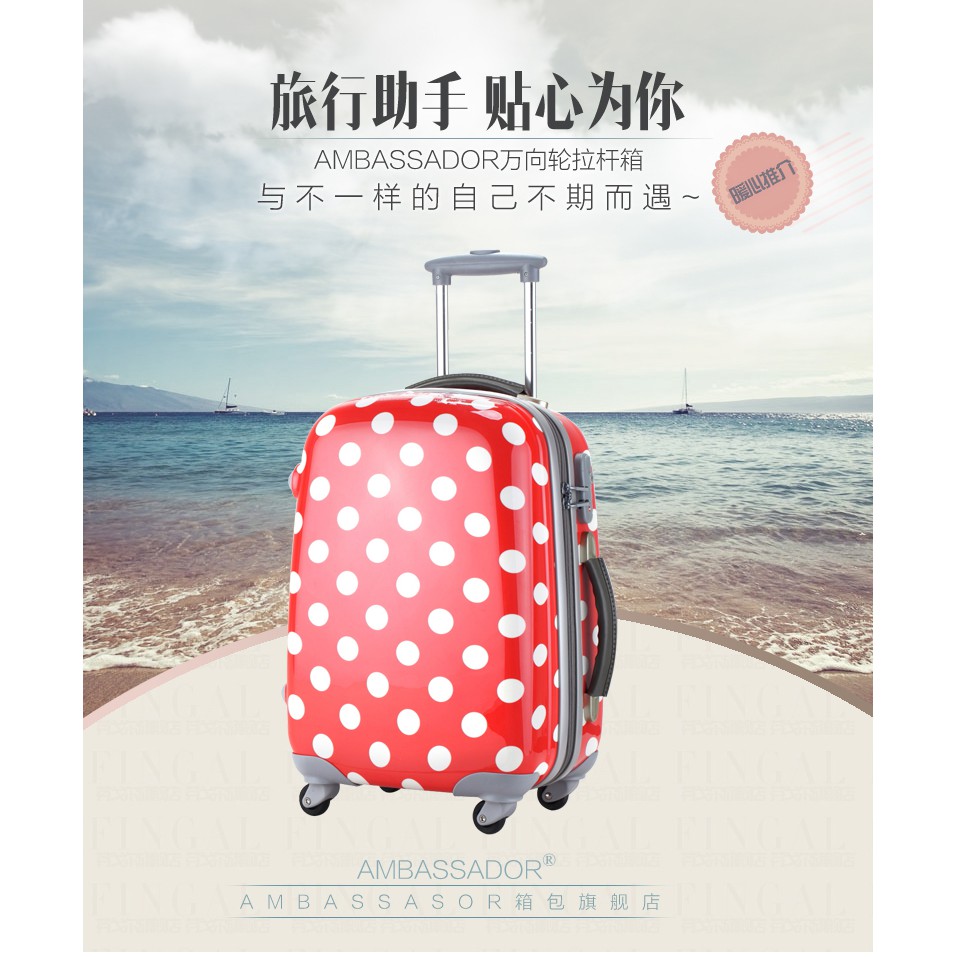 red polka dot luggage