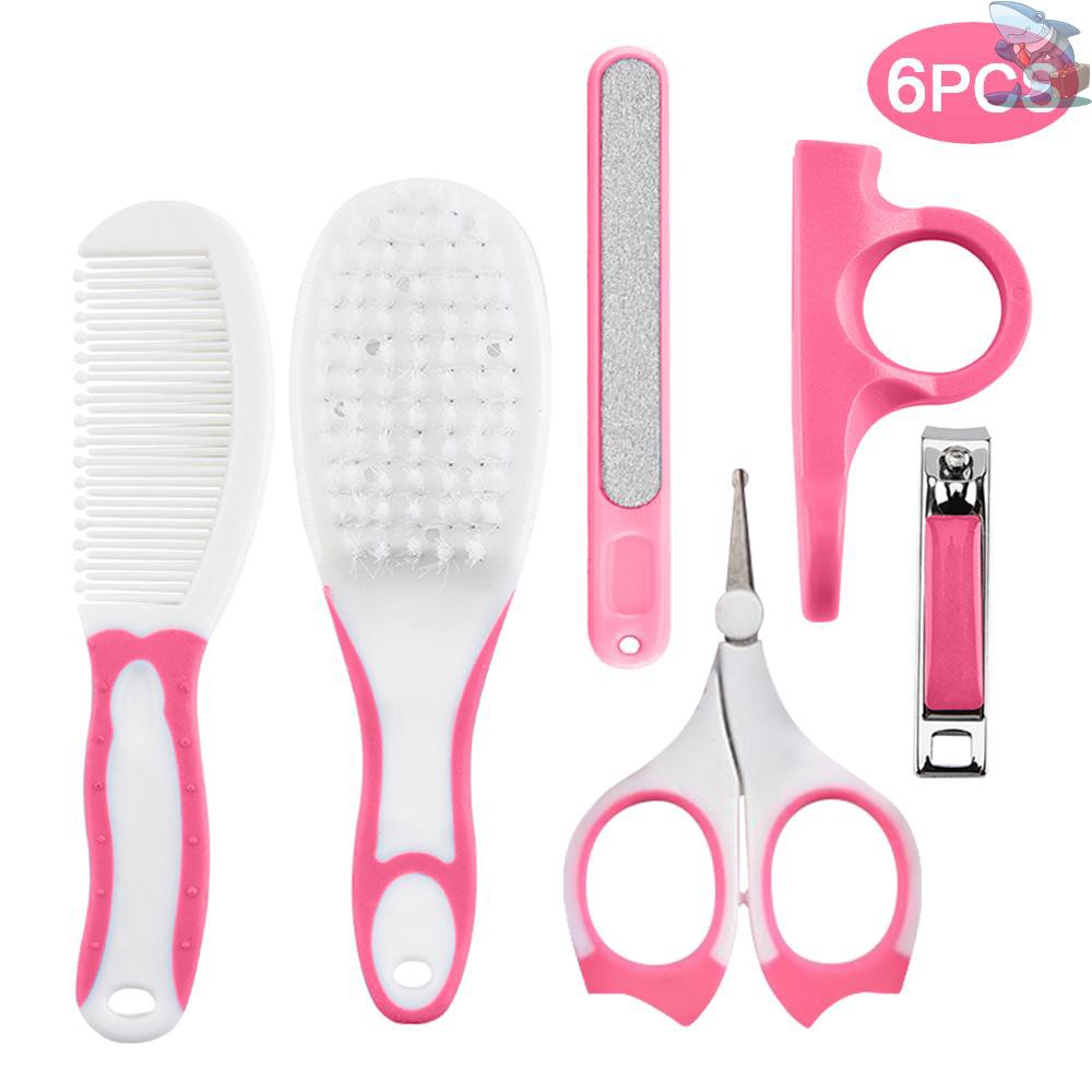 baby nail clippers and hair brush
