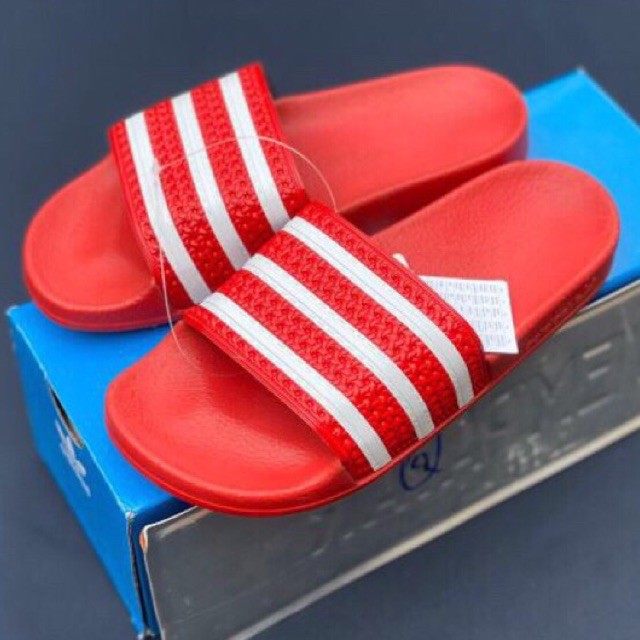 red and white adidas sandals