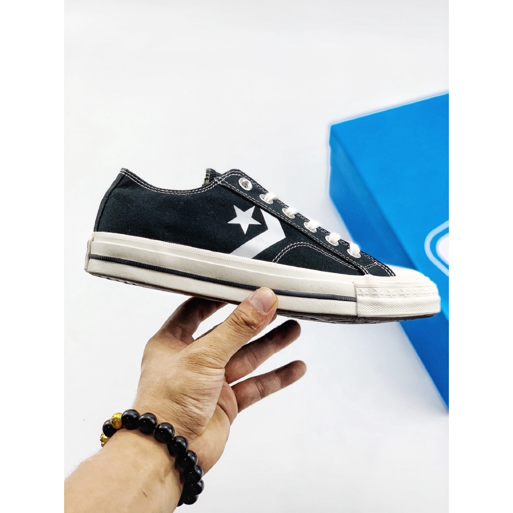 shoes with arrow logo