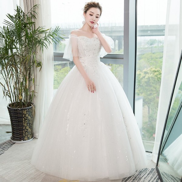 The Bridal Dress Was Covered With Breasts And White Bridal Dresses