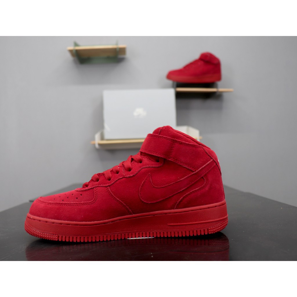 red high top nike air force ones