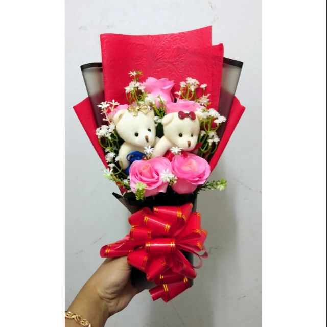 bouquet of roses with teddy bear