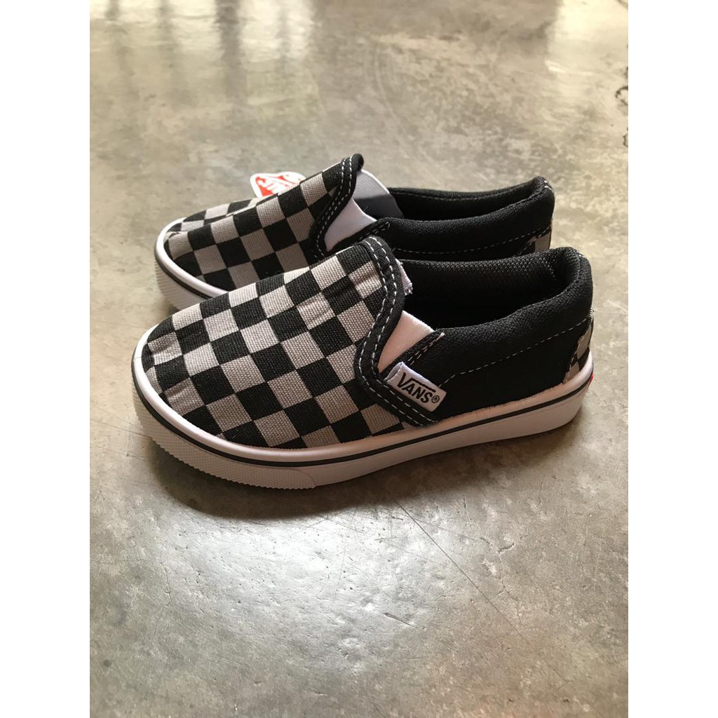 vans checkerboard slip on kids