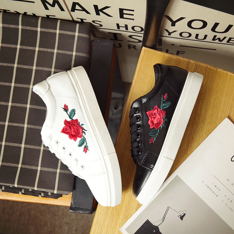 white sneakers with floral embroidery