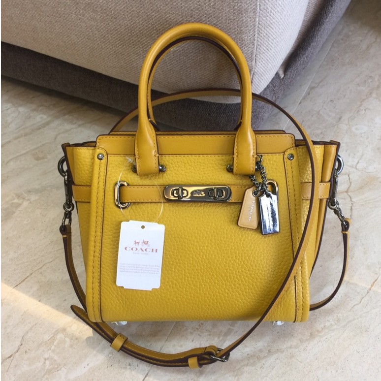 yellow coach crossbody bag