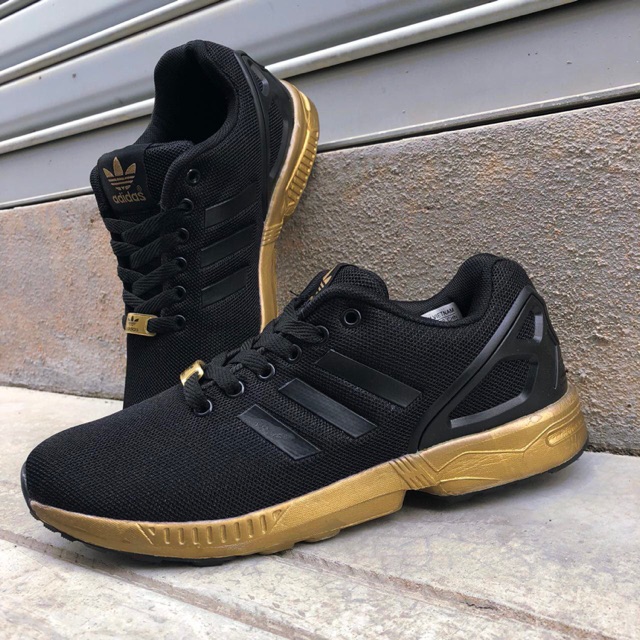 zx flux shoes gold