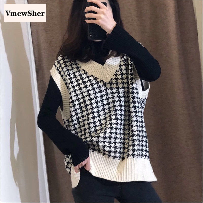 black sweater vest outfit