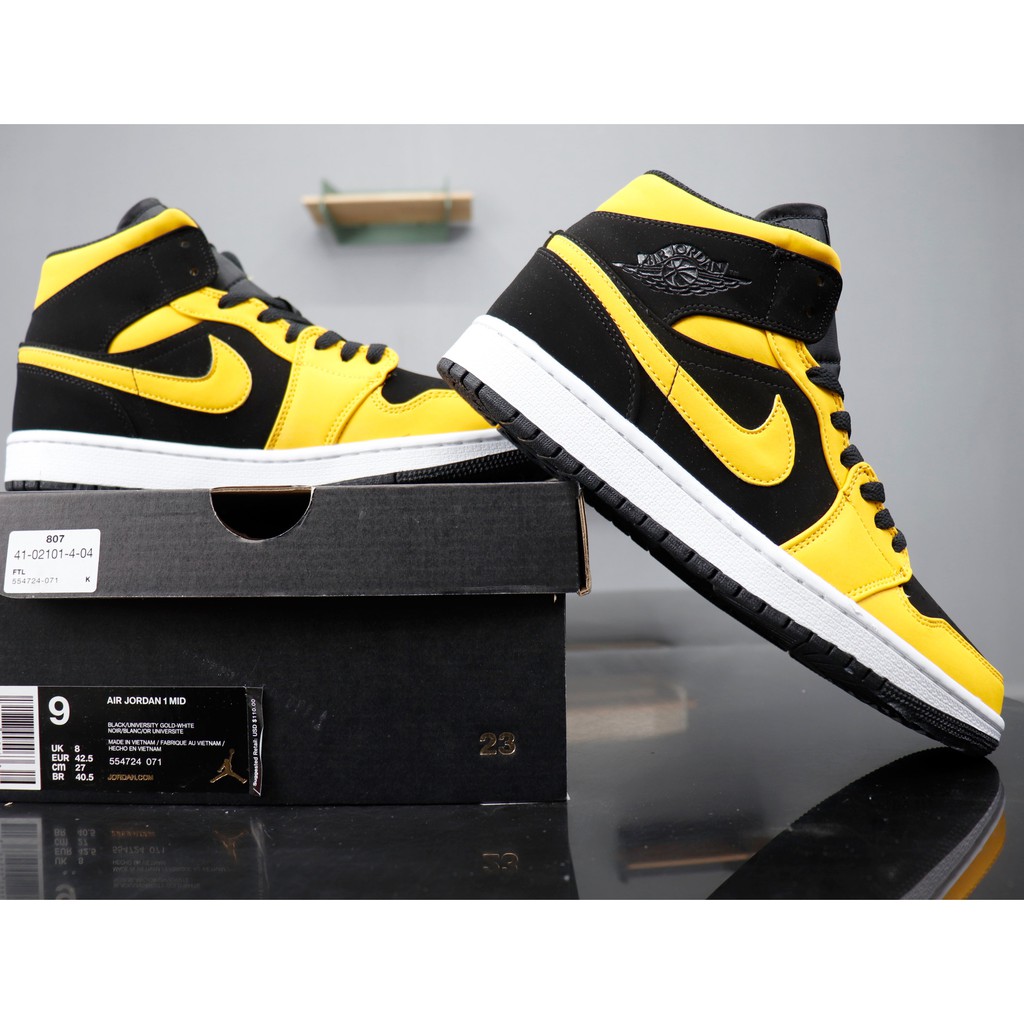 jordan 1s black and yellow