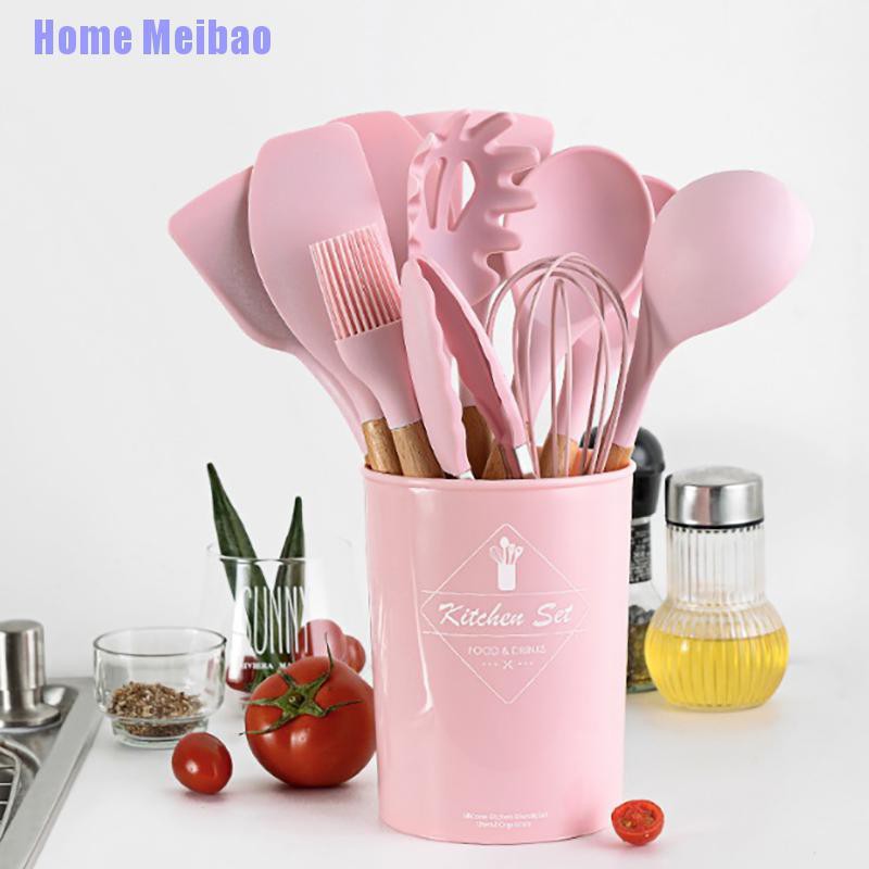 pink wooden cooking set