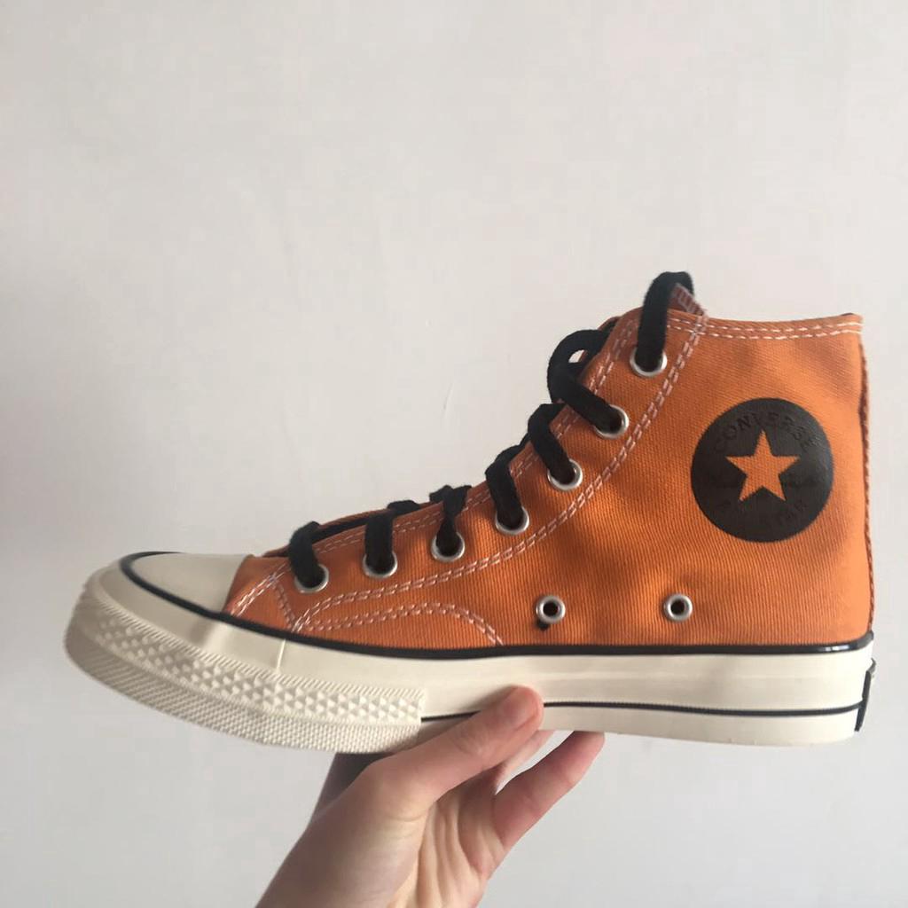 orange chuck taylors mens