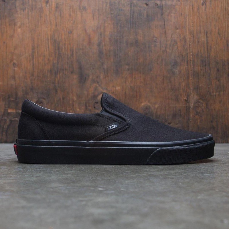 slip on full black vans