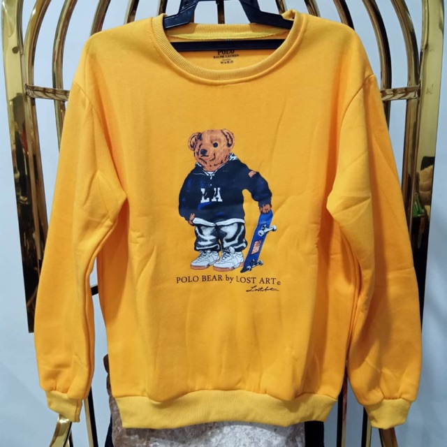 yellow polo bear shirt