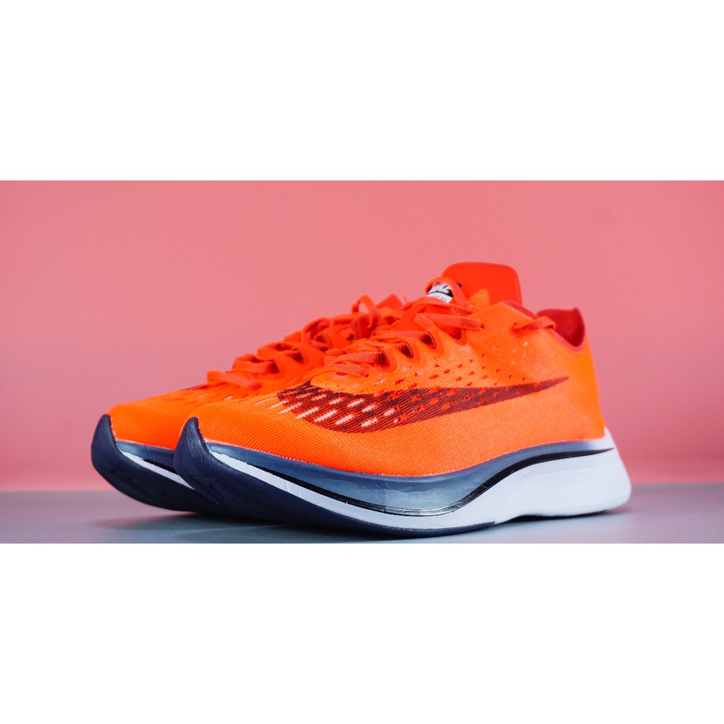 orange running shoes