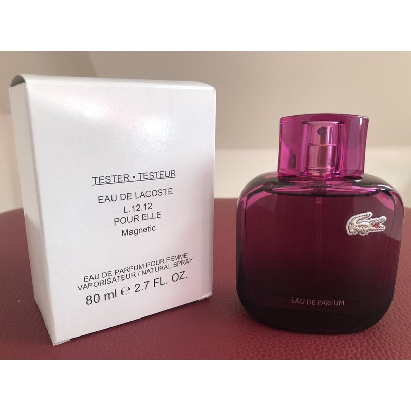 lacoste purple perfume