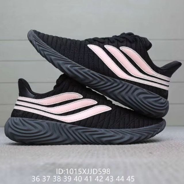 black adidas shoes with pink stripes