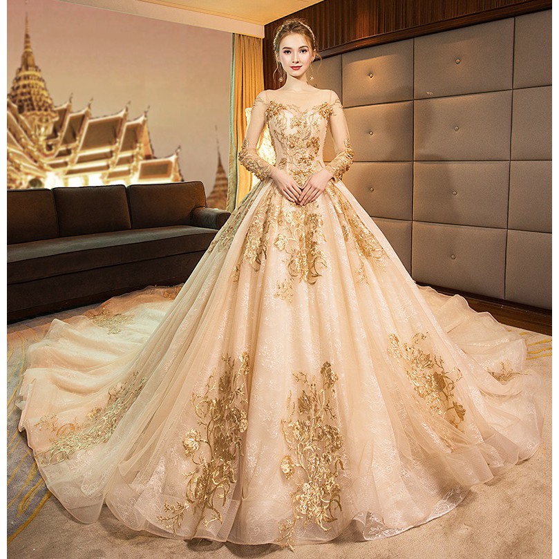 white and gold bridal dress