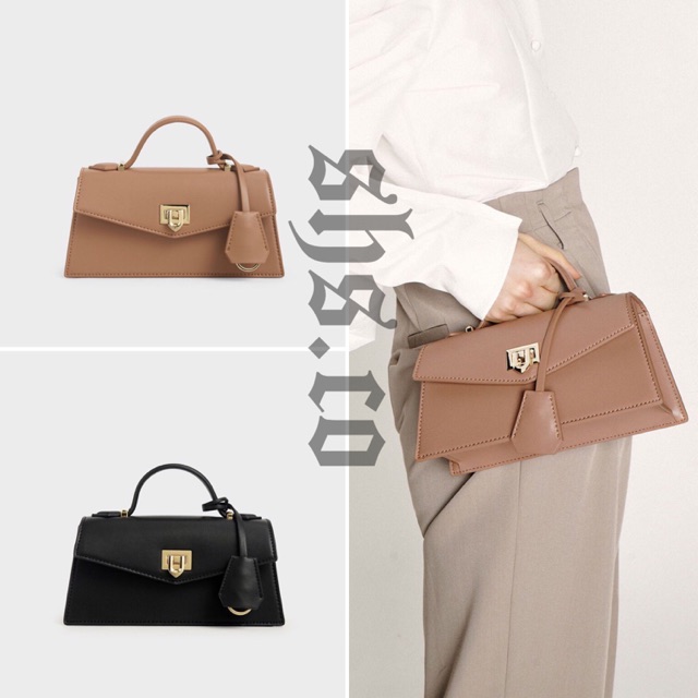 top handle trapeze bag