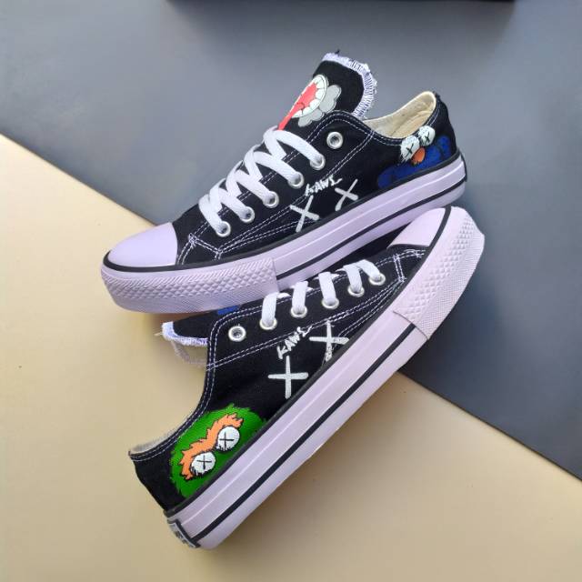 converse x kaws black