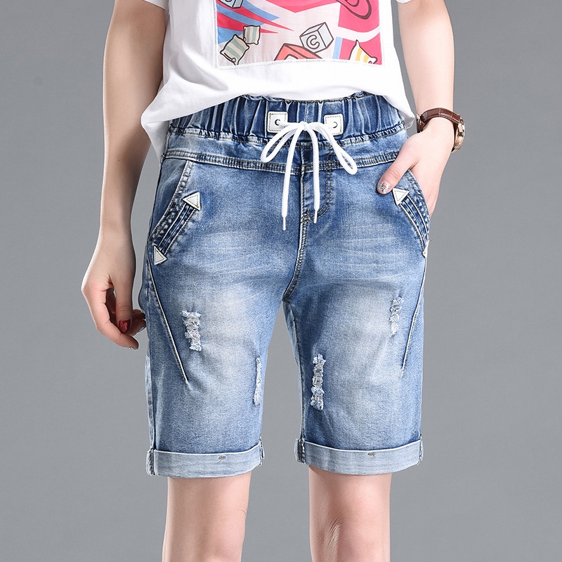 knee length ripped denim shorts