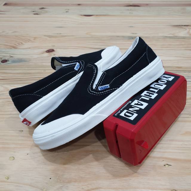 vans slip on half moon