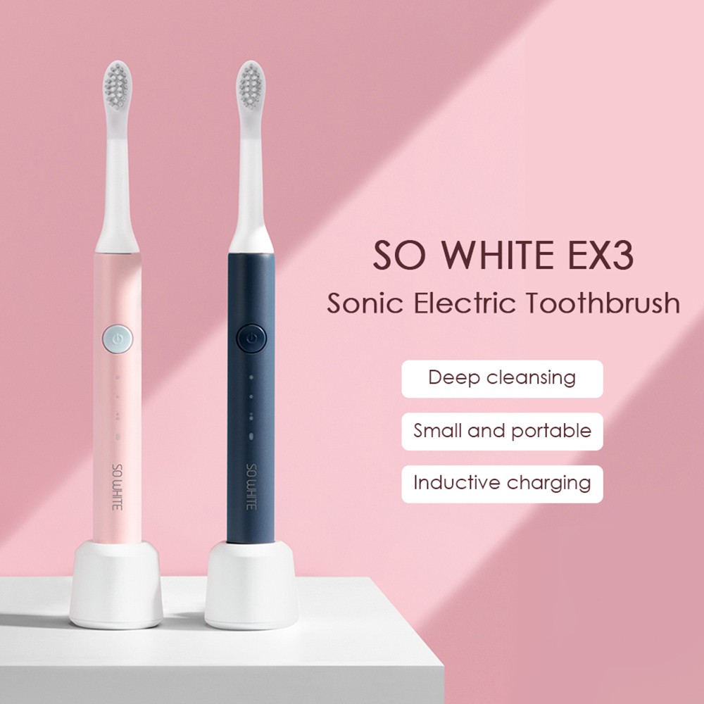white automatic toothbrush